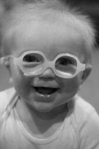 Middle Baby Boy in his First Pair of Glasses - 7 months old. Middle Baby Boy in his First Pair of Glasses - 7 months old.
