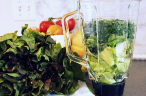 Smoothie greens go in and it's blender time Smoothie greens go in and it's blender time